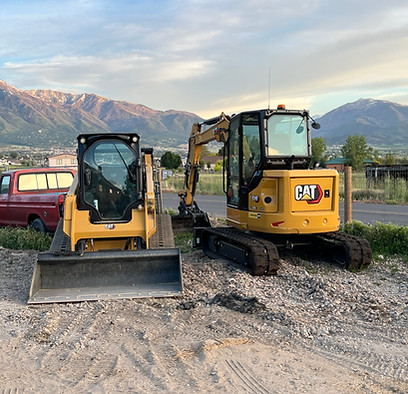 mini excavator and skid steer loader